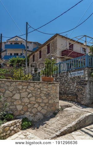 AGIOS NIKITAS, LEFKADA, GREECE JULY 16, 2014: Traditional houses in village of Agios Nikitas, Lefkada, Ionian Islands, Greece