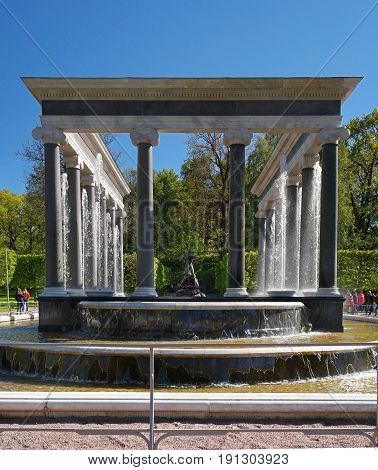 Petergof, Russia - June 5, 2017: The Lion Cascade fountain. Another name is the Hermitage. It is a pool with waterfall ledges of pudost stone, decorated with two bronze sculptures of guard lions.