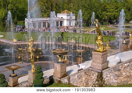 Petergof, Russia - June 5, 2017: Great cascade. It consists of many fountains and is decorated with bronze gilt sculptures. During the holidays, it becomes a stage for costumed performances.