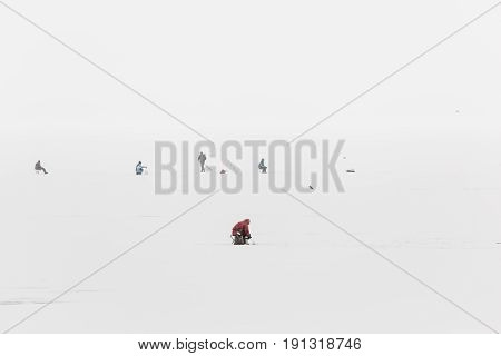 Fishermen on the river. Winter fishing on the Volga