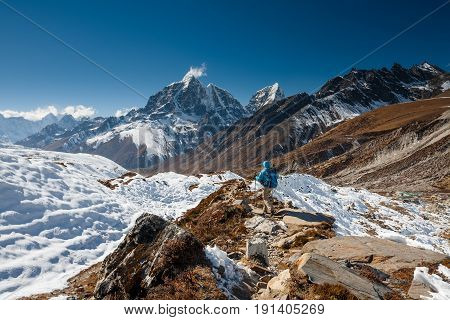 Trekker in Khumbu valley on a way to Everest Base camp
