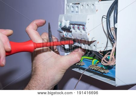Electrician at work working man detail, man at work