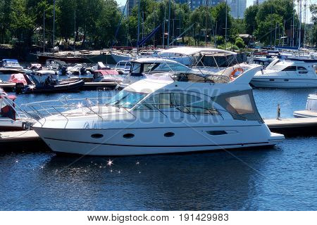 Yachts in port. Boat mooring in the river port