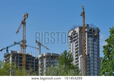 cityscape development of a new modern houses in urban city blue sky and trees around