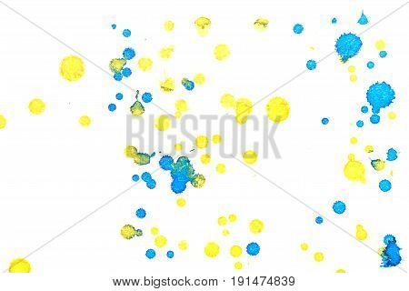 Abstract two-color yellow blue ink splash. Ink blots. Elements of design. The water-soluble ink on white paper Leste. Abstractionism