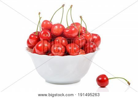 Cherry in dish isolated on white background