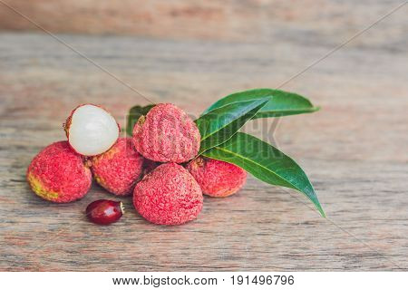 Fresh Litchi Fruit On An Old Wooden Background