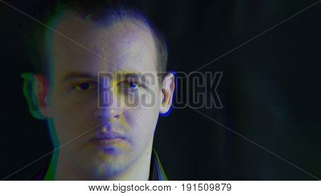 The man's face, distorted with random characters. Concept: a glitch in the matrix. glitch chromatic aberration.