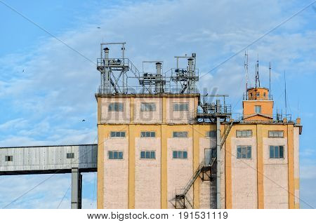 Plant for the production of baked goods. Elements of the facade of the production building. Factory background