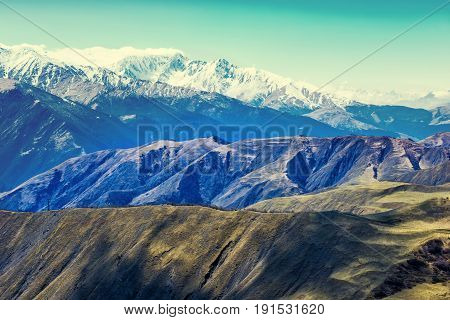 beautiful landscape of Caucasus mountains with blue sky Russia Republic Ingushetia
