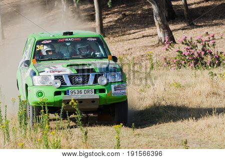EXTREMADURA SPAIN - JUN 17: Driver and codriver Participing in TT Spanish Rally Championship. Badajoz Dehesa de Extremadura.