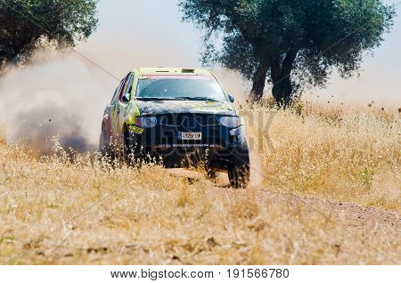 EXTREMADURA SPAIN - JUN 17: Driver and codriver Participing in TT Spanish Rally Championship. Badajoz Dehesa de Extremadura.