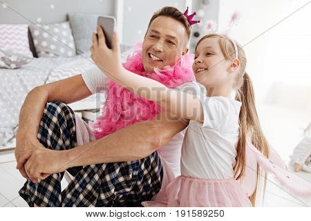 So much pink. Loving optimistic nice dad doing anything for making his child smile and dressing up like a princess while playing with her