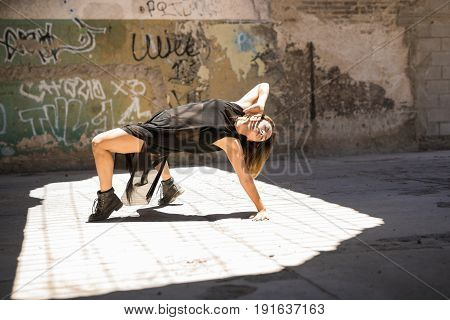 Woman Dancing And Performing Outdoors
