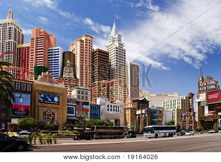 LAS VEGAS â MAY 2: Automobiles and tourist buses travel past the New York, New York Hotel & Casino on May 2, 2007 in Las Vegas. The hotel skyline architecture simulates the real New York City skyline.