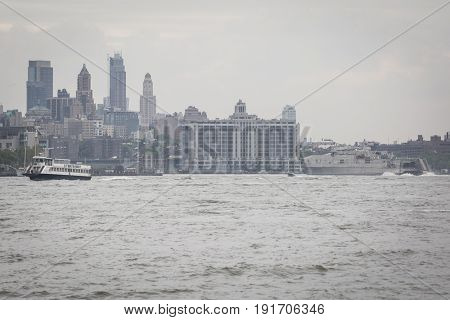 USNS Yuma (EPF 8) Spearhead-class expeditionary fast transport heads to Brooklyn from the Hudson River during the Parade of Ships marking the start of Fleet Week New York, JERSEY CITY NJ MAY 24 2017.