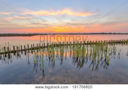 Sunset Over Lake With Lake Shore Protection