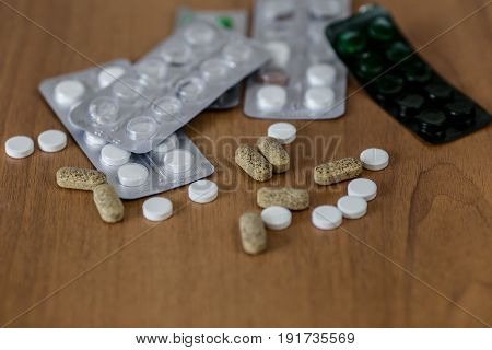 Disease Concept. No To Drugs And Pills Concept. Packaging Of Tablets And Pills On The Table