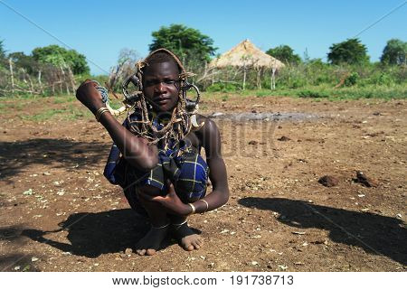 Mursi tribe woman - 05 october 2012 Omo valley Ethiopia