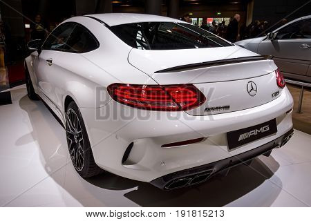STUTTGART GERMANY - MARCH 03 2017: Compact luxury car Mercedes-AMG C63 S Coupe 2016. Rear view. Europe's greatest classic car exhibition 
