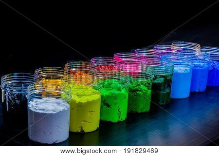 ink or paint for printing on fabric there are several types. The ink used for printing on dark fabric always use plastisol ink. it useful for white fabric too