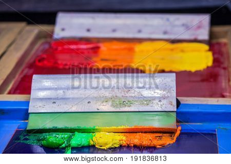 ink or paint for printing on fabric there are several types. The ink used for printing on dark fabric always use plastisol ink. it useful for white fabric too