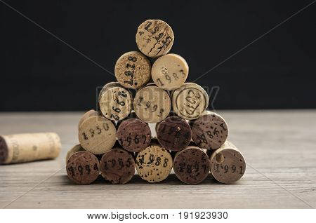 Close up shot of a stack of dated wine bottle corks