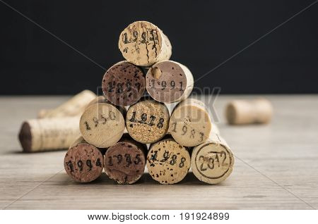 Close up shot of a stack of dated wine bottle corks