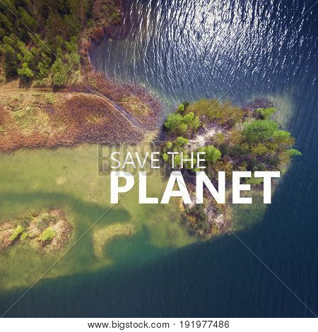 Save the Planet. Lake and forest during spring time. View from above.