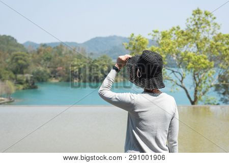 traveling Asian woman at the outdoor in daytime