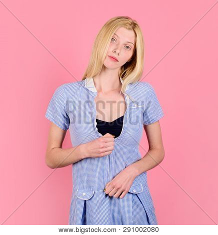 Getting Dressed. Pretty Blonde Woman Trying To Zipper On Dress. Girl In Blue Dress Holding Her Zippe
