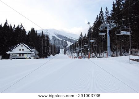 Jasna, Slovakia - January 24, 2019: Beautiful Morning View Of The Mountains And Ski Slopes In The Re
