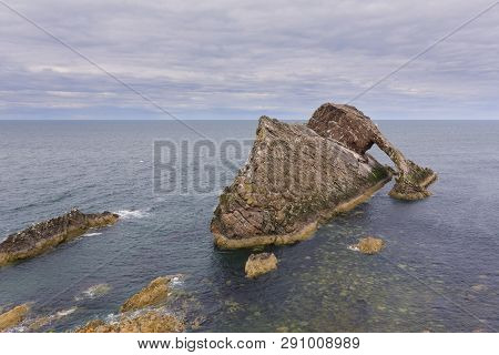 Bow-fidle Rock Landscape On The Coast Of Scotland On A Cloudy Afternoon