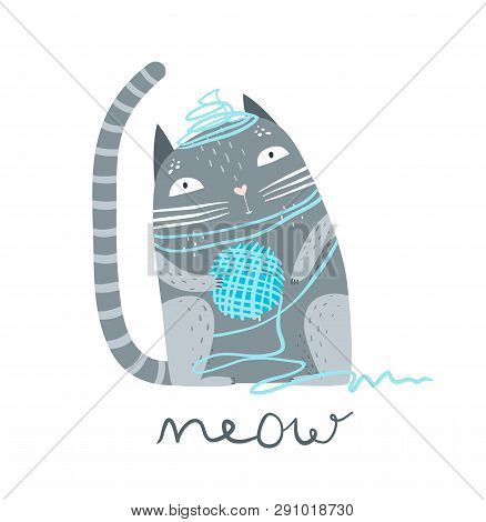 Cute Pet Kitten Sitting With Woollen Yarn.