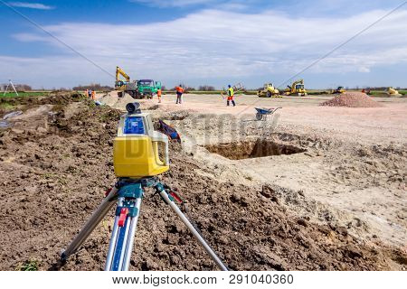 Total Center Device With Laser For Leveling Other Devices To Level Construction Site.