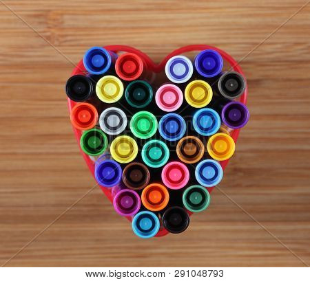 Washable Markers In A Heart Bowl. Close-up.