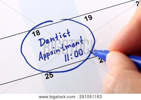 Human Hand Writes Reminder 