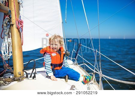 Kids Sail On Yacht In Sea. Child Sailing On Boat.