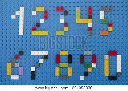 Tambov, Russian Federation - February 14, 2015 Lego Custom Numbers On Lego Blue Baseplate Background
