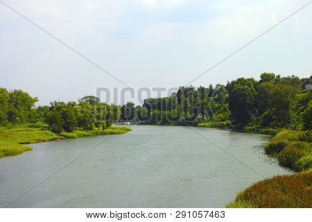 Landscape With River, Trees And Sky. Nature Background