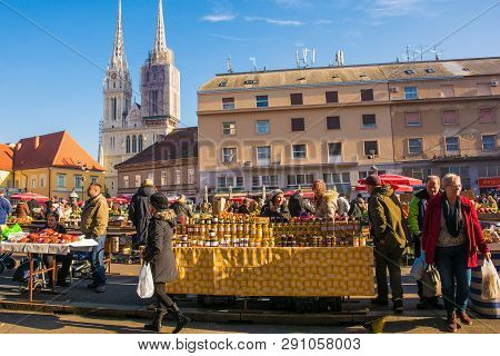 Zagreb, Croatia - December 29th 2018. Customers Shop For Fresh Fruit, Vegetables And Honey At The Do