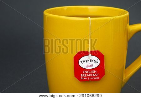 Tambov, Russian Federation - August 28, 2017 Cup Of Twinings English Breakfast Tea. Dark Green Backg