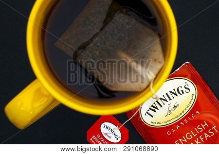 Tambov, Russian Federation - August 28, 2017 Cup Of Twinings English Breakfast Tea With Teabag On Bl