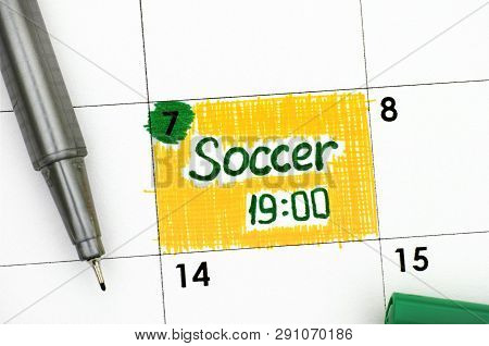 Reminder Soccer 19-00 In Calendar With Green Pen. Close-up.