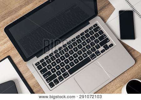 Top View Of Desktop With Laptop