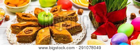 Novruz Ramadan In Azerbaijan. Colored Eggs, Wheat Springs For Easter And Traditional Sweets. Selecti