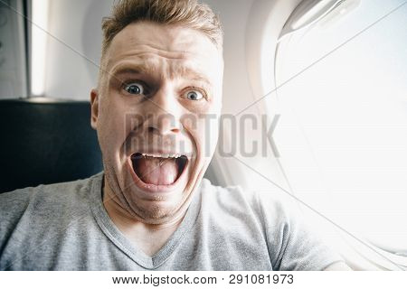Concept Aerophobia. Afraid Of Fear Flying On An Airplane And At Height.