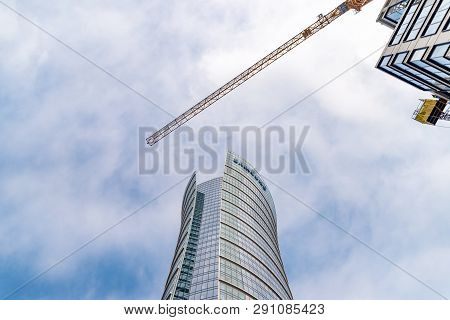 Warsaw, Poland. February 18, 2019. Business Center. Glass Building. Against The Sky.