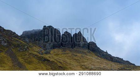 The landscape around the Old Man of Storr and the Storr cliffs, the famous attraction in Isle of Skye, Scotland, United Kingdom