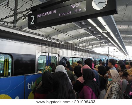 Jakarta, Indonesia - March 23, 2019: Crowd Of People Getting On The Train At Lebak Bulus Mrt Station